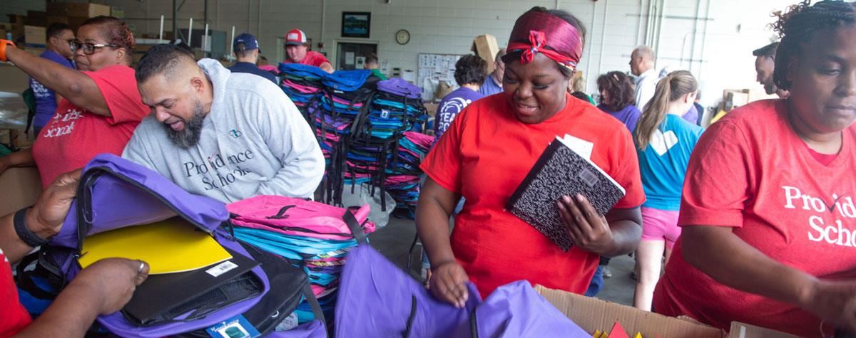 Volunteers at Back to School Celebration